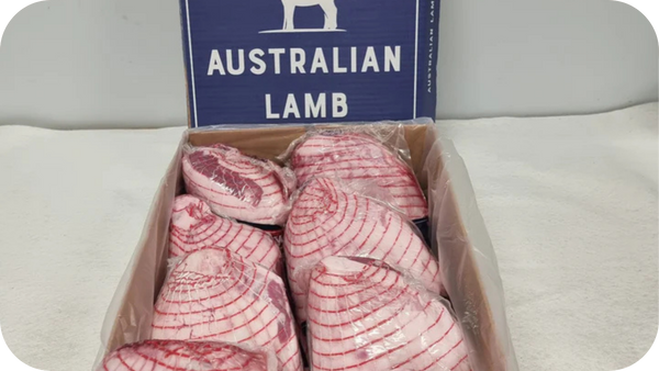 Australian Lamb box containing several netted lamb legs wrapped in clear plastic, ready for wholesale distribution.