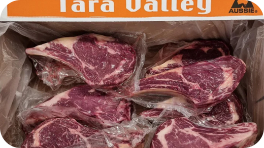  A box filled with various cuts of meat, showcasing the high-quality marbled steaks of Tara Valley beef, vacuum-sealed for freshness.