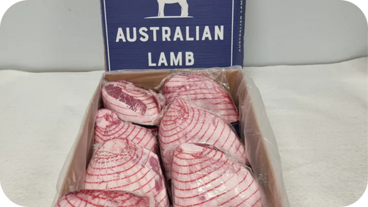 Australian Lamb box containing several netted lamb legs wrapped in clear plastic, ready for wholesale distribution.