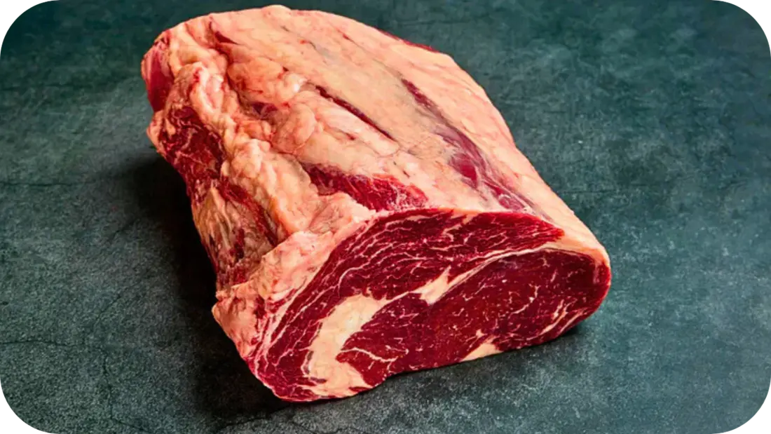 Fresh grass-fed beef cut with visible marbling, highlighting natural quality and CLA benefits for flavour, nutrition, and health