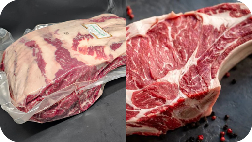 tomahawk steak in clear wrapping alongside rib-eye steak with other ingredients. 