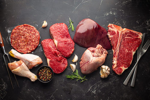 Variety of carnivore diet foods, including beef steak, liver, chicken and patties, showing typical animal foods eaten on a carnivore diet in Australia.