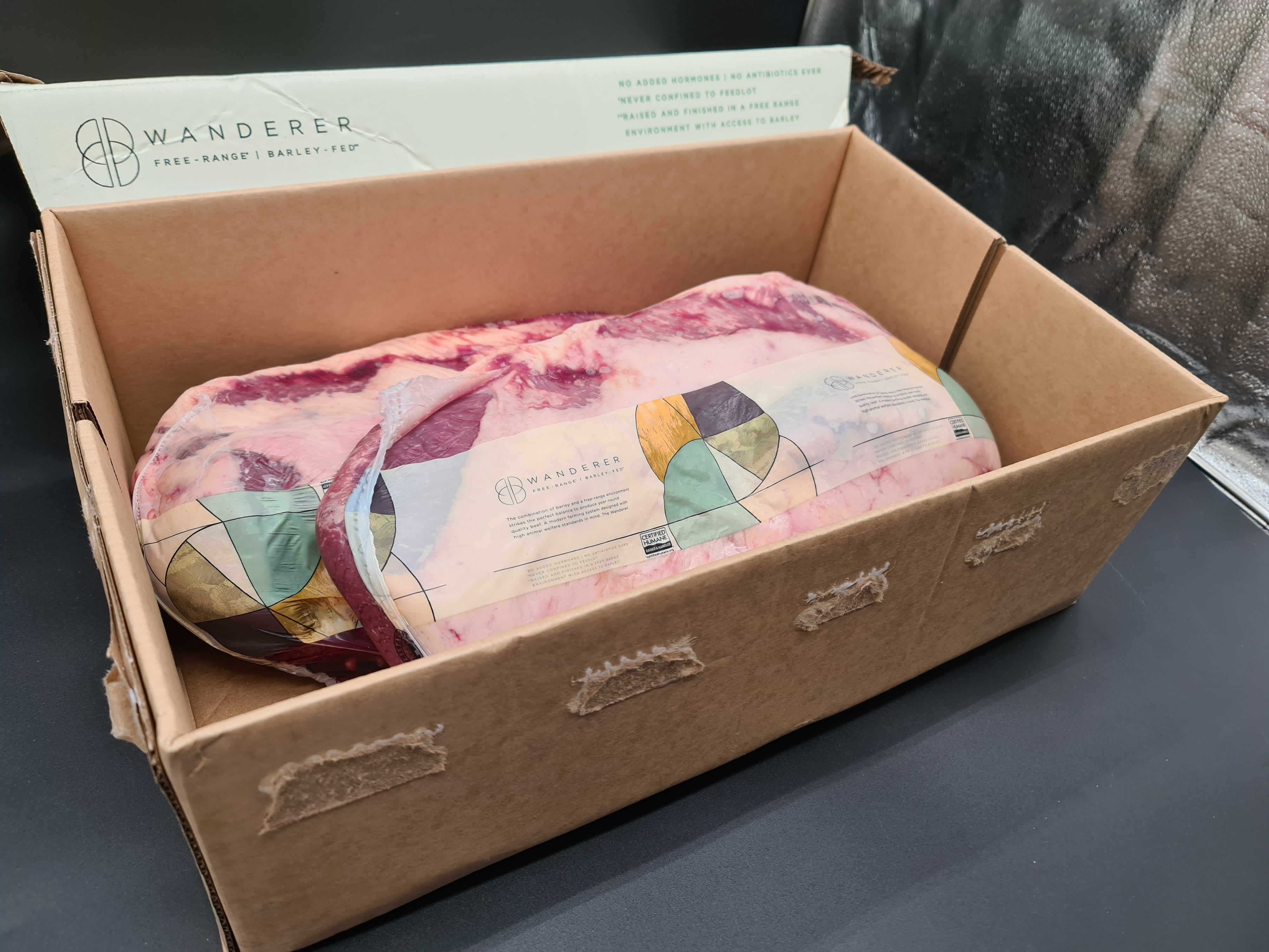 Close-up of Wanderer beef cuts in an open cardboard box
