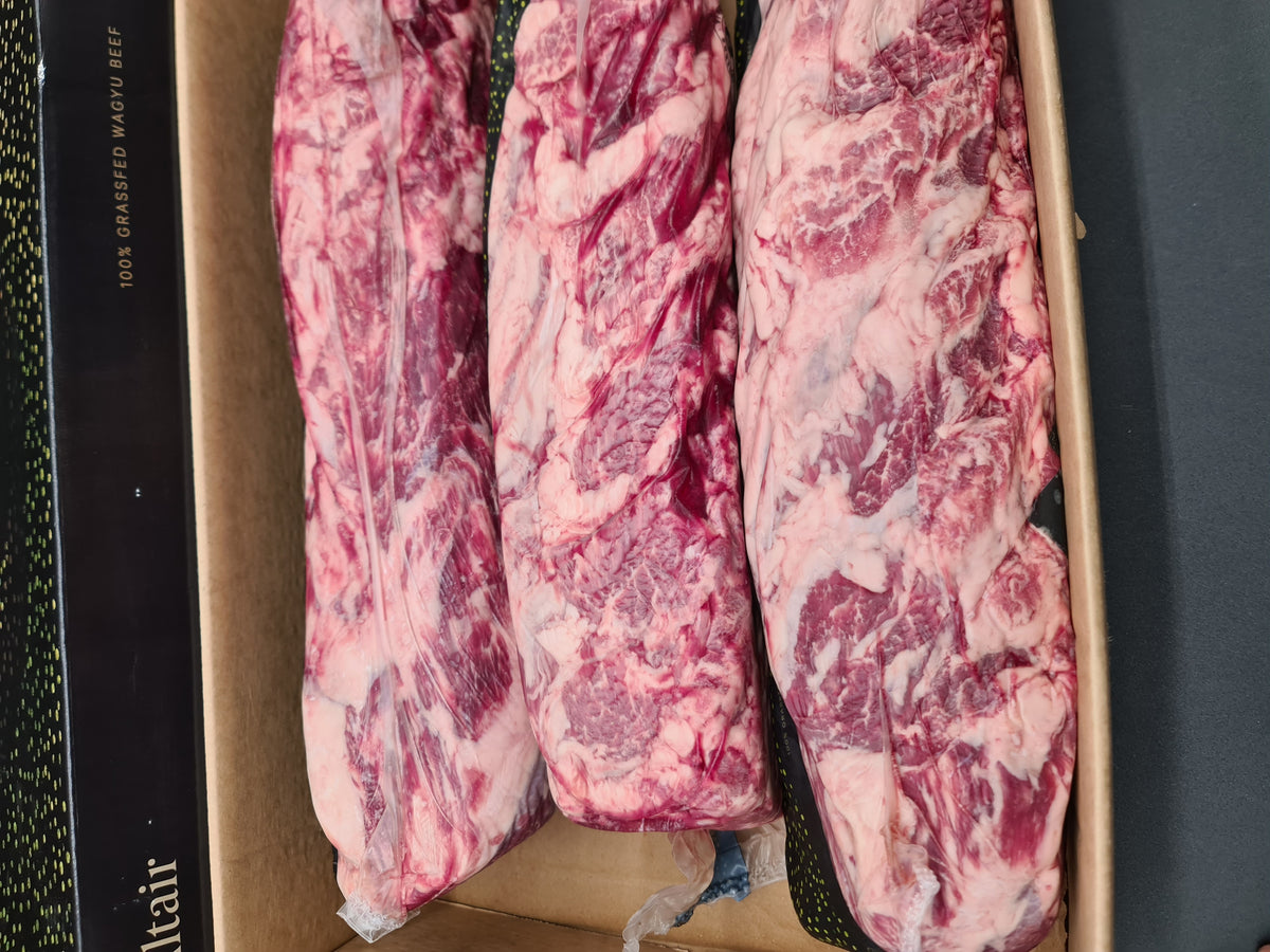 Angled Altair Wagyu beef cut showing marbling and fat cap