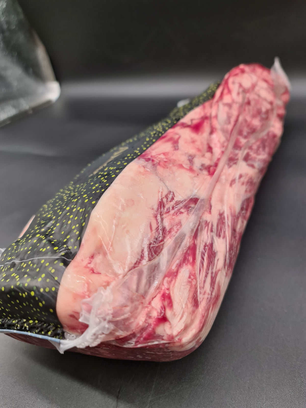 Close-up of two Altair Wagyu beef cuts in clear packaging