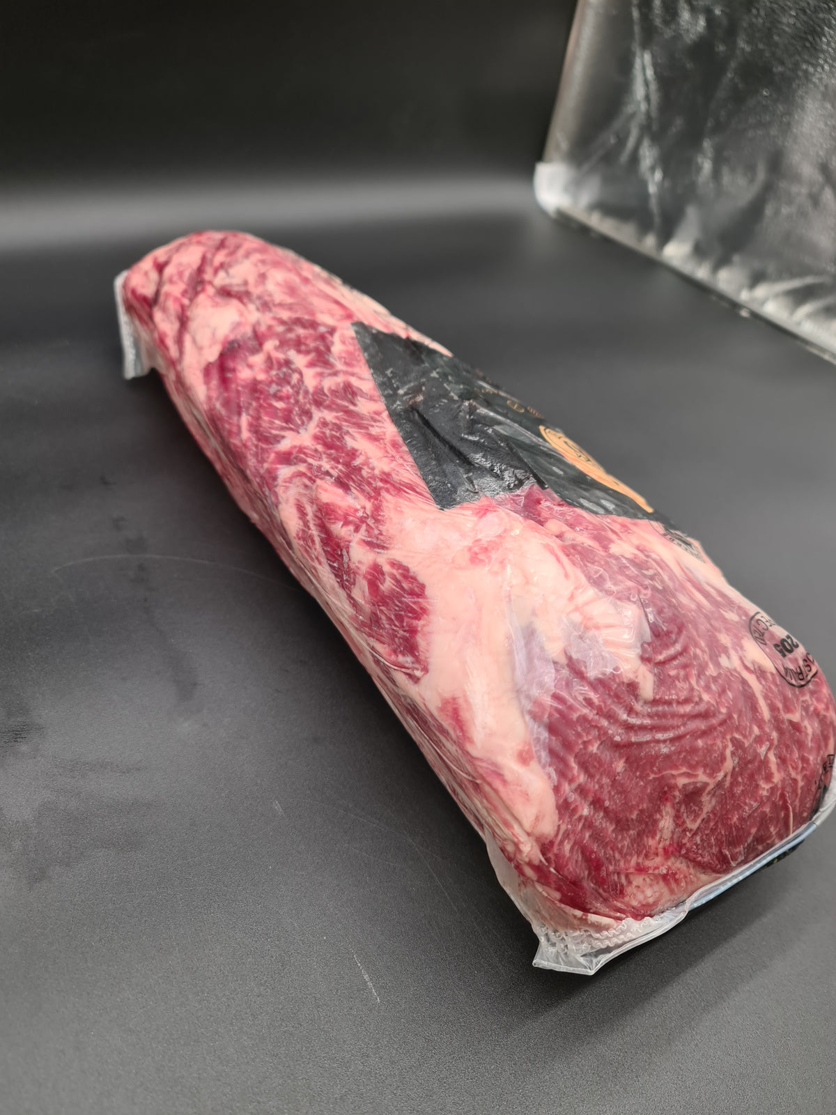 Top view of Altair Wagyu beef cuts in an open box
