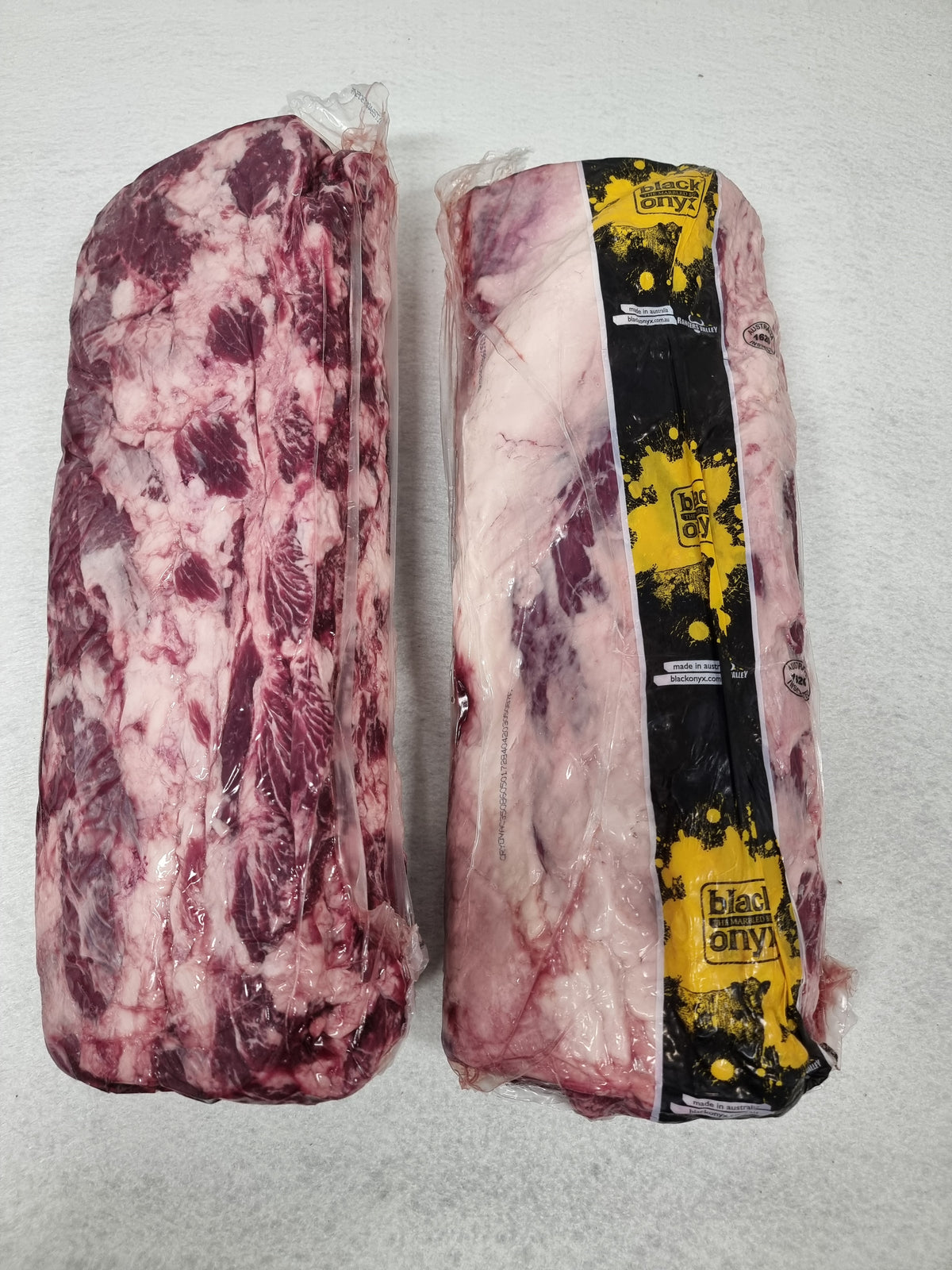 Closed premium meat box on a white surface