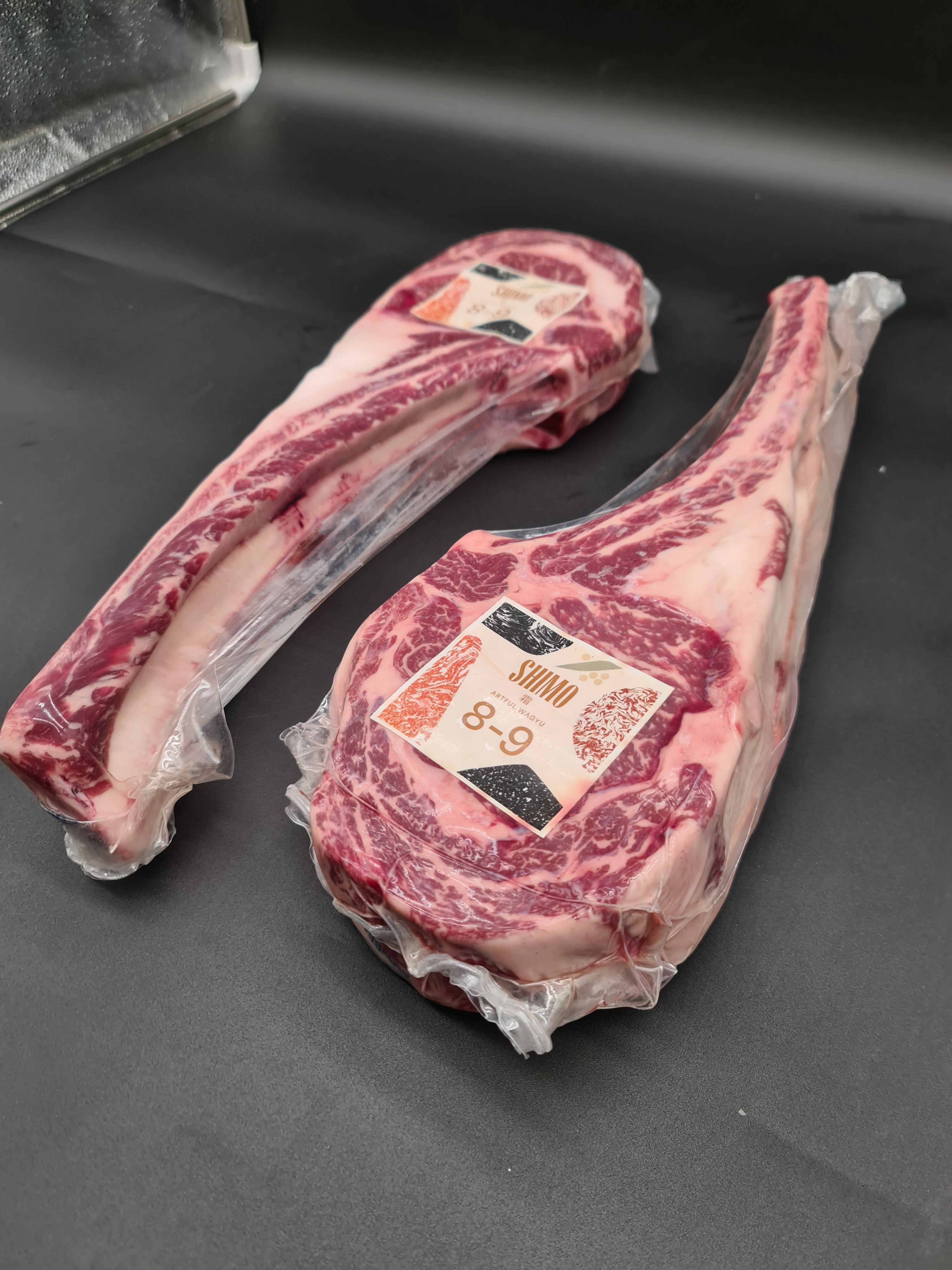 Shimo Wagyu tomahawk rib close up showing marbling