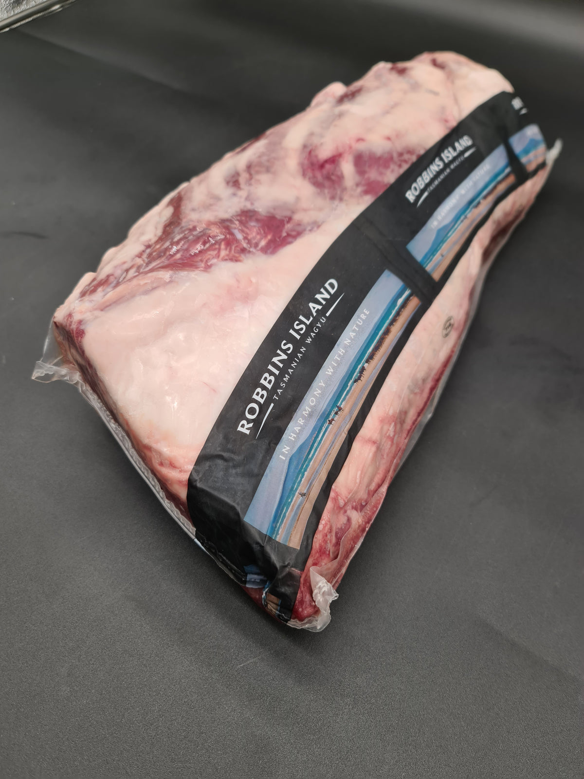 Angled view of packed premium cuts inside an open box