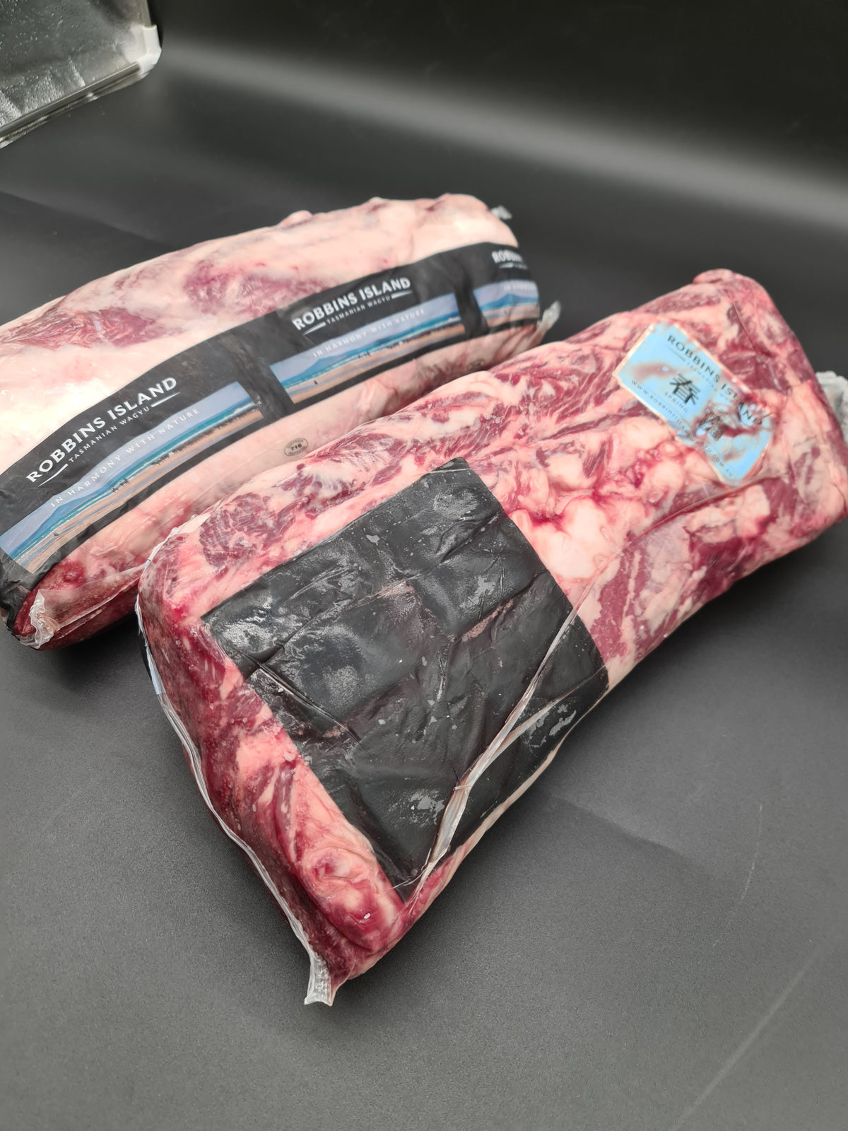 Top view of packed premium beef cuts in a box