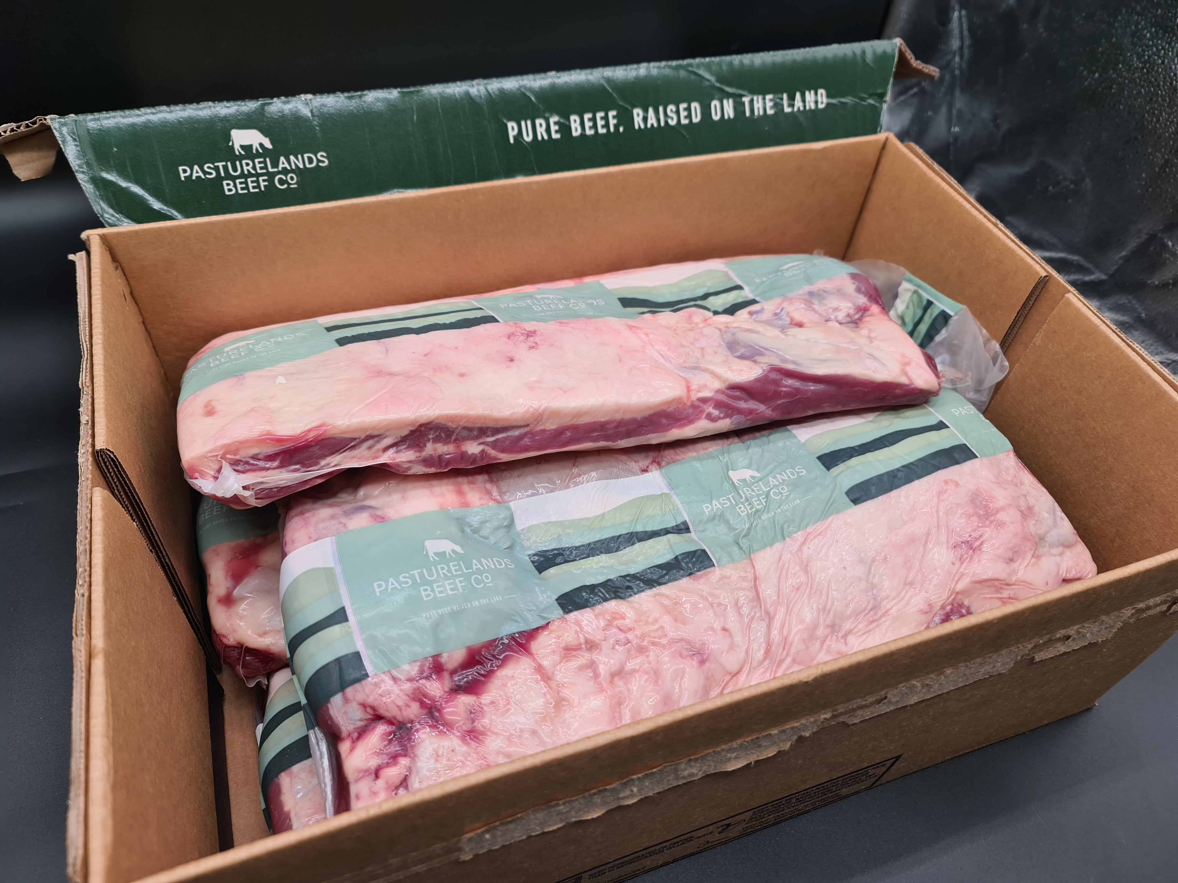 Angled view of closed premium beef box