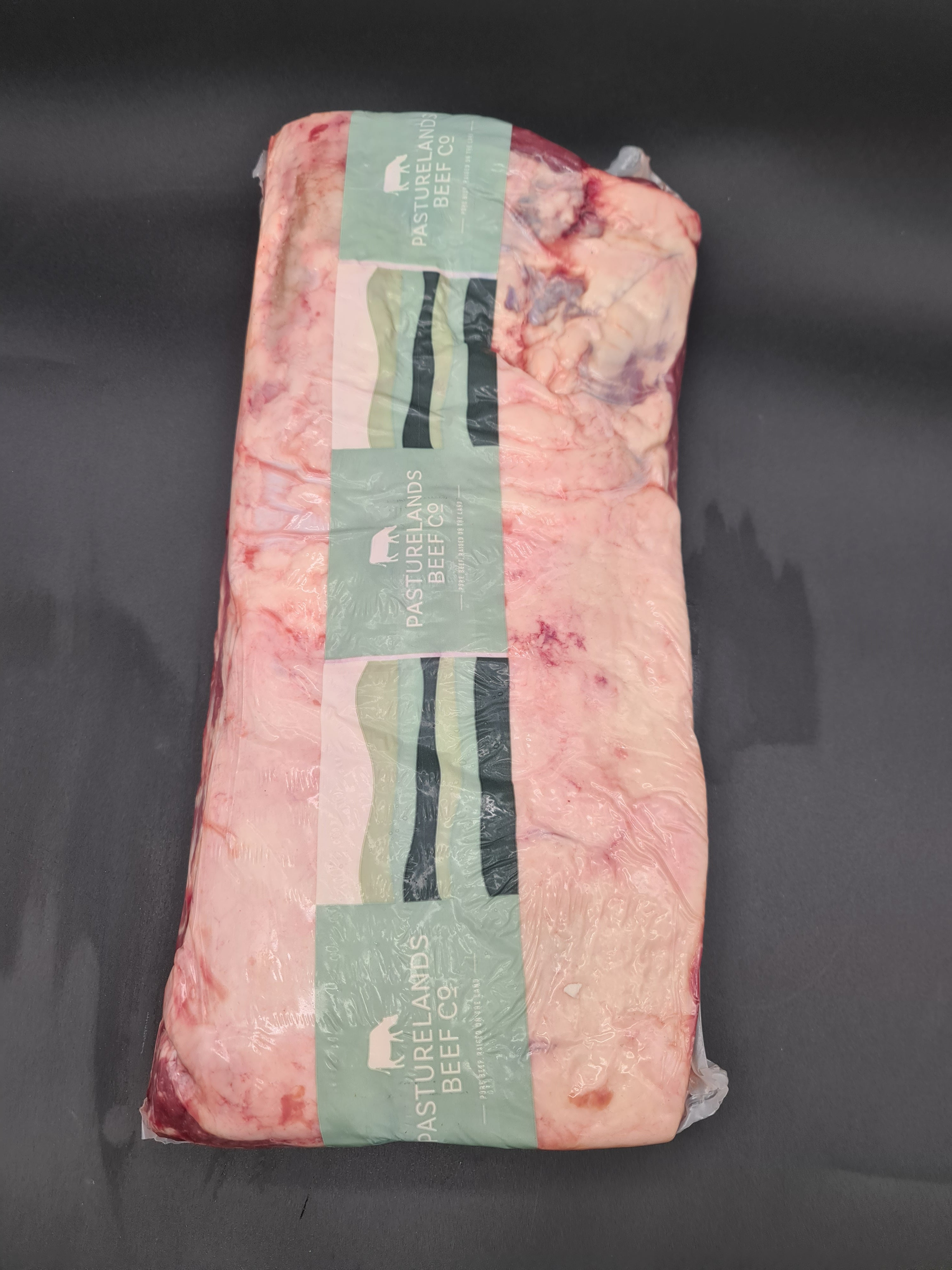 Close-up of premium beef cuts in an open box