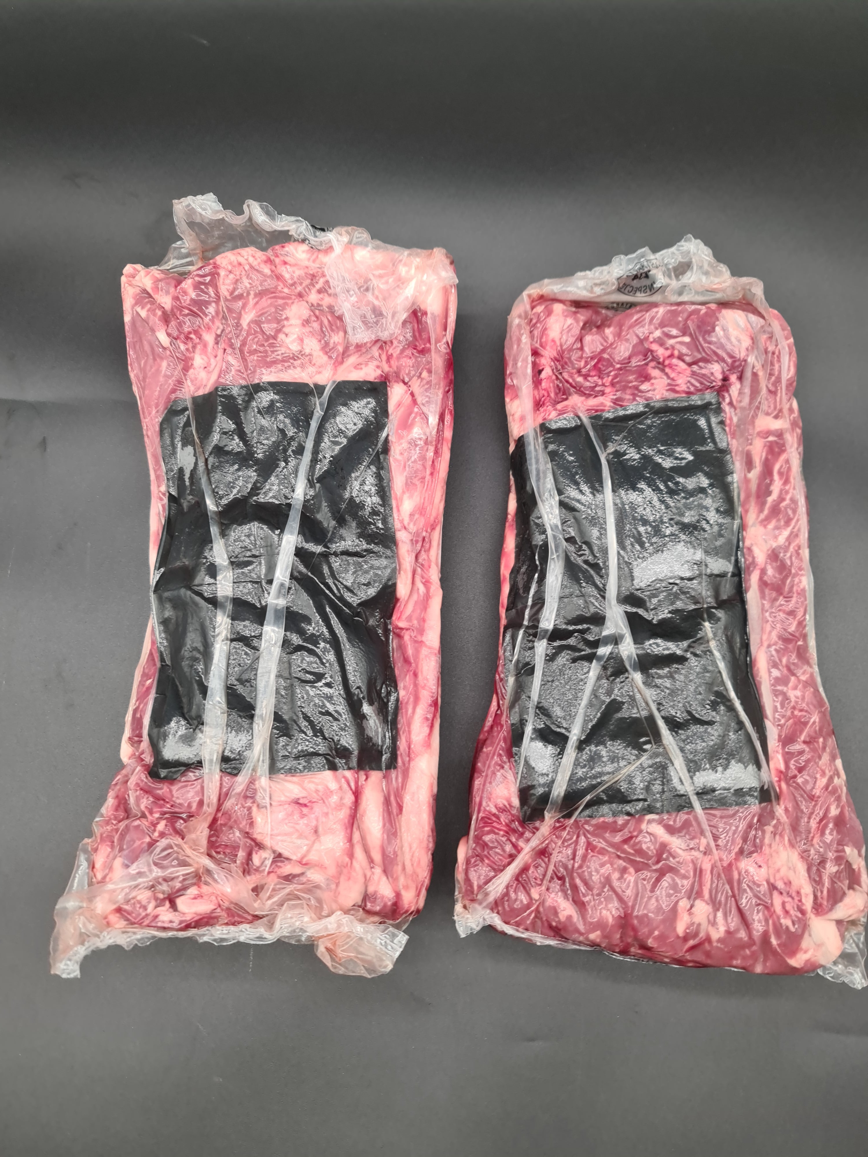 Angled premium meat cut with visible fat cap