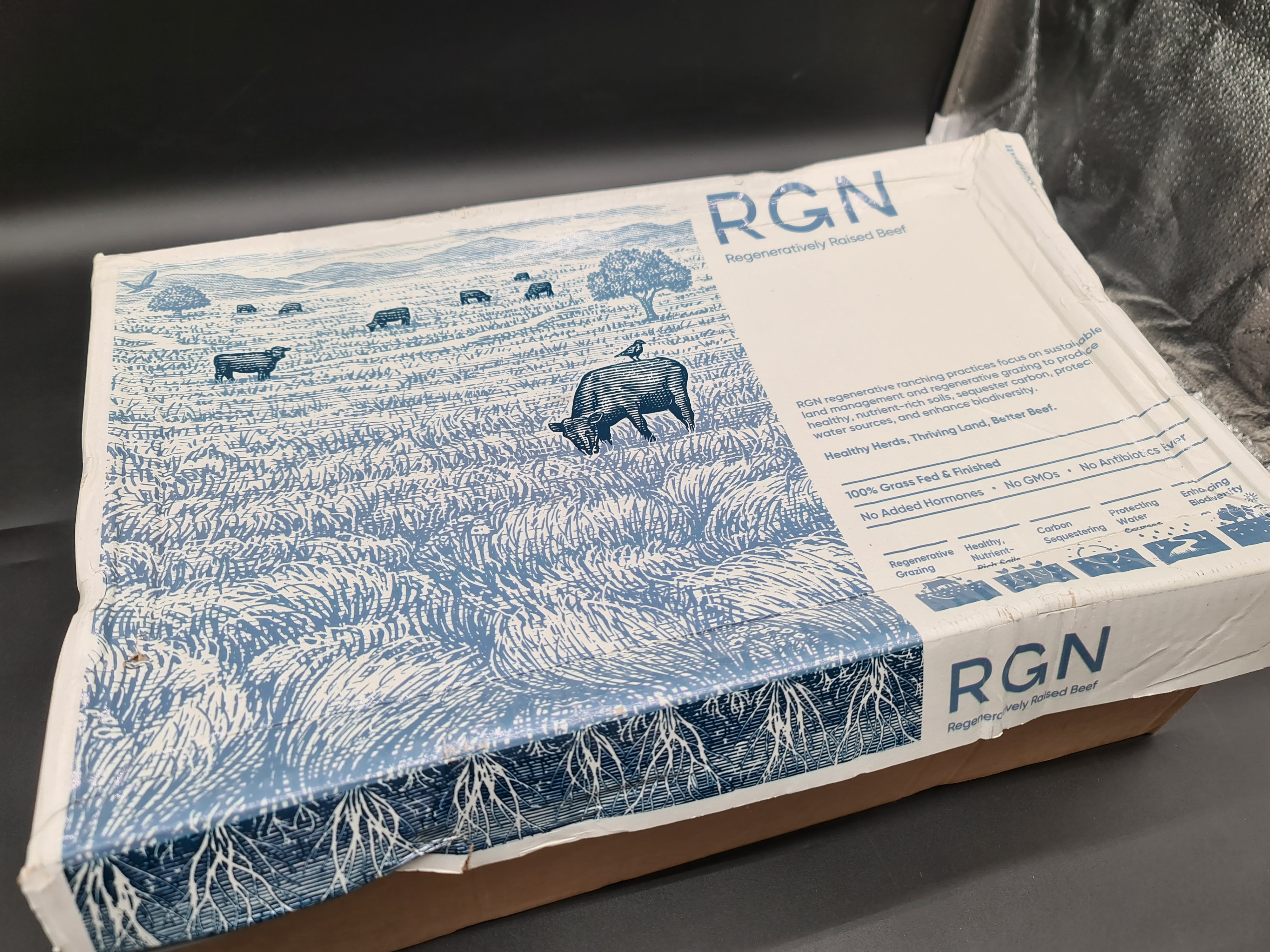 Angled view of closed premium meat box