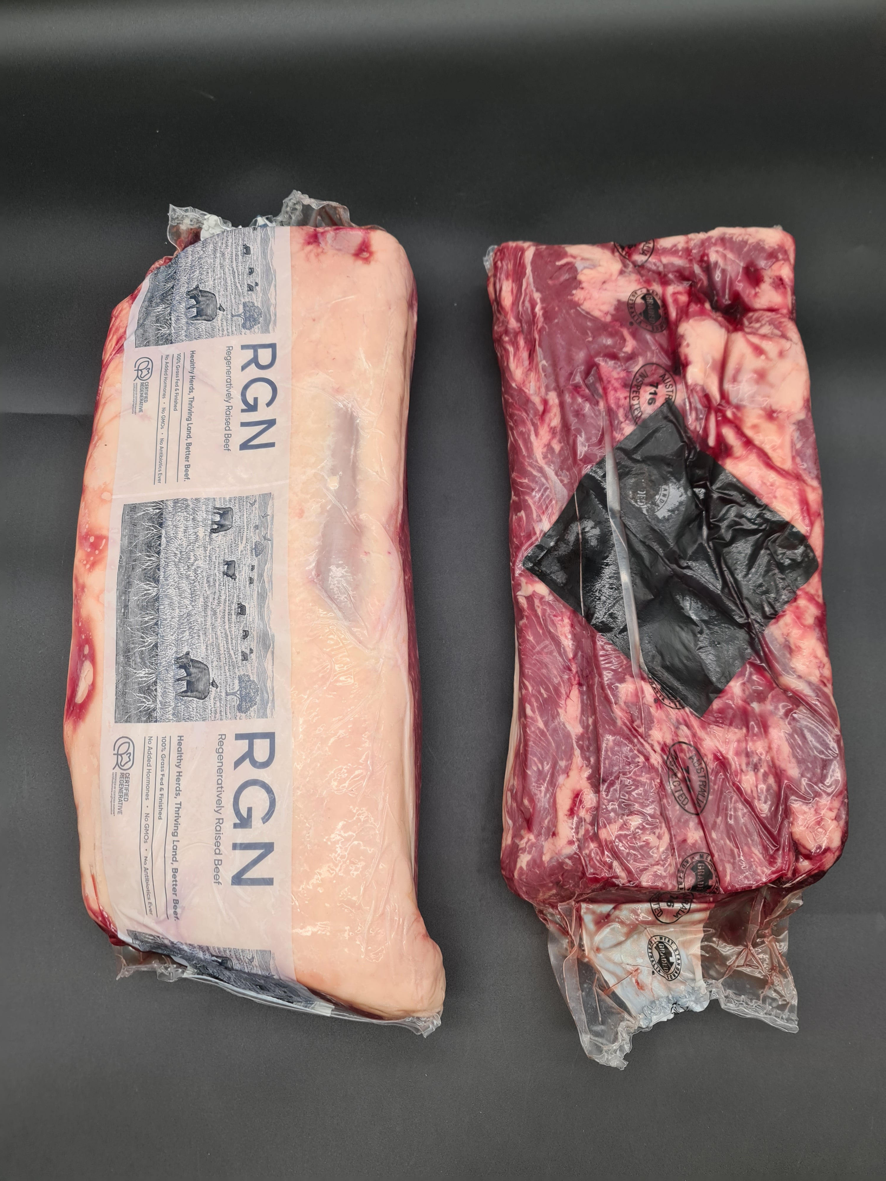 Angled view of packed premium meat cuts in a box