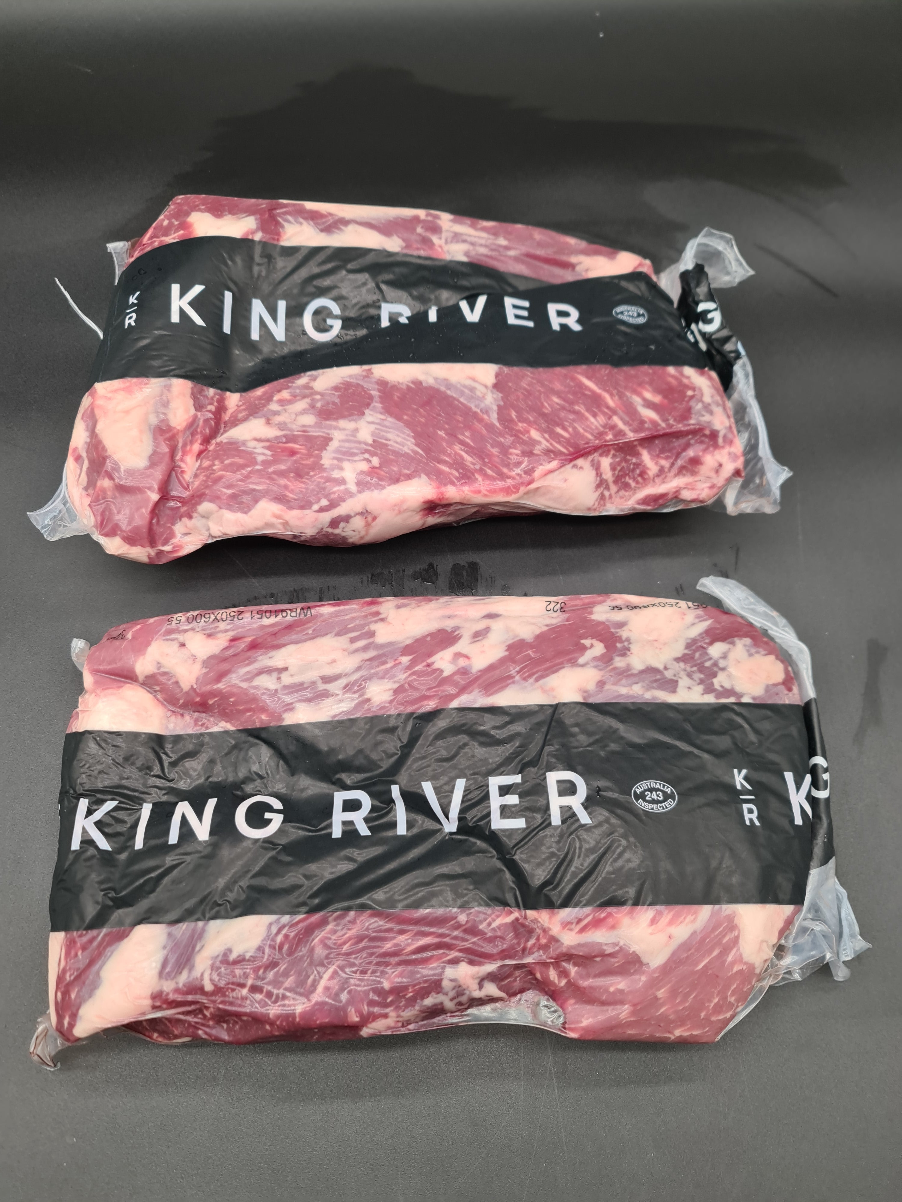Angled view of closed branded premium meat box