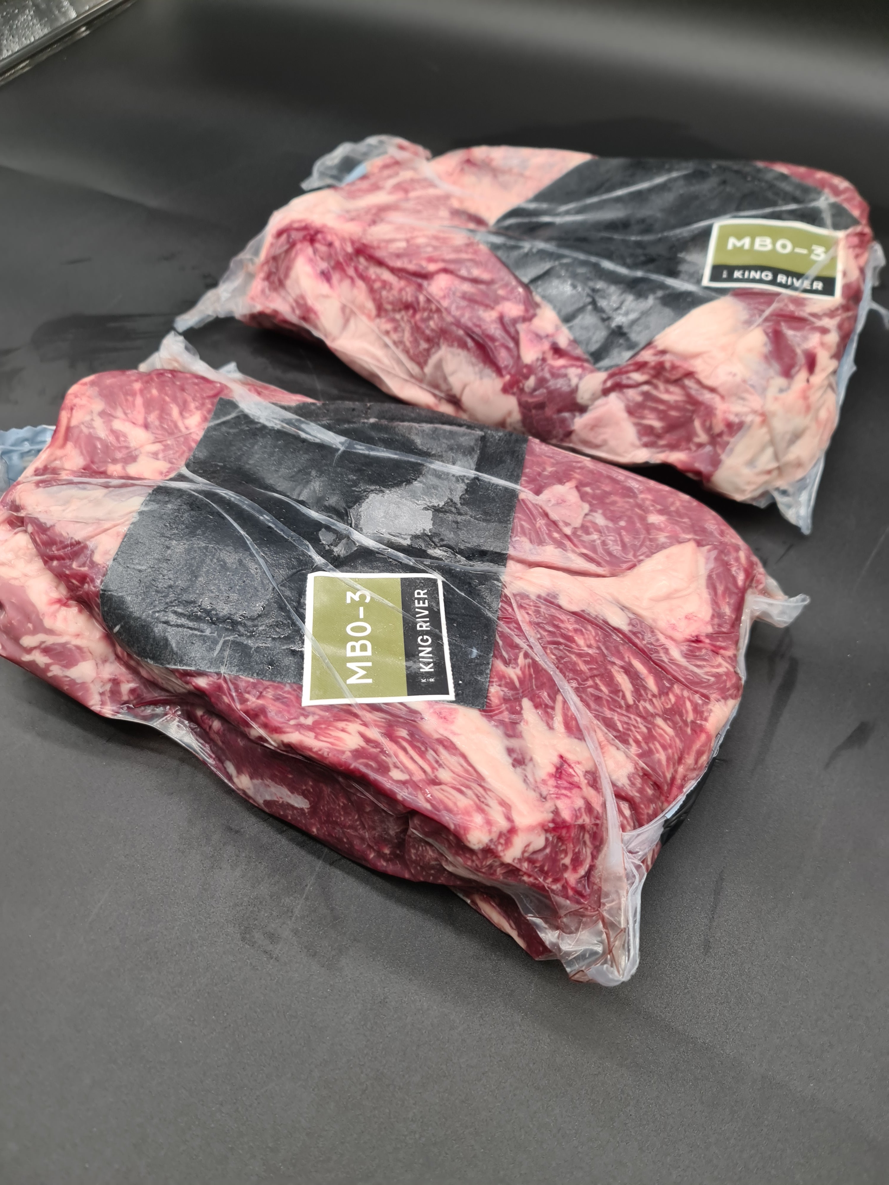 Vacuum-packed premium meat cut with visible label