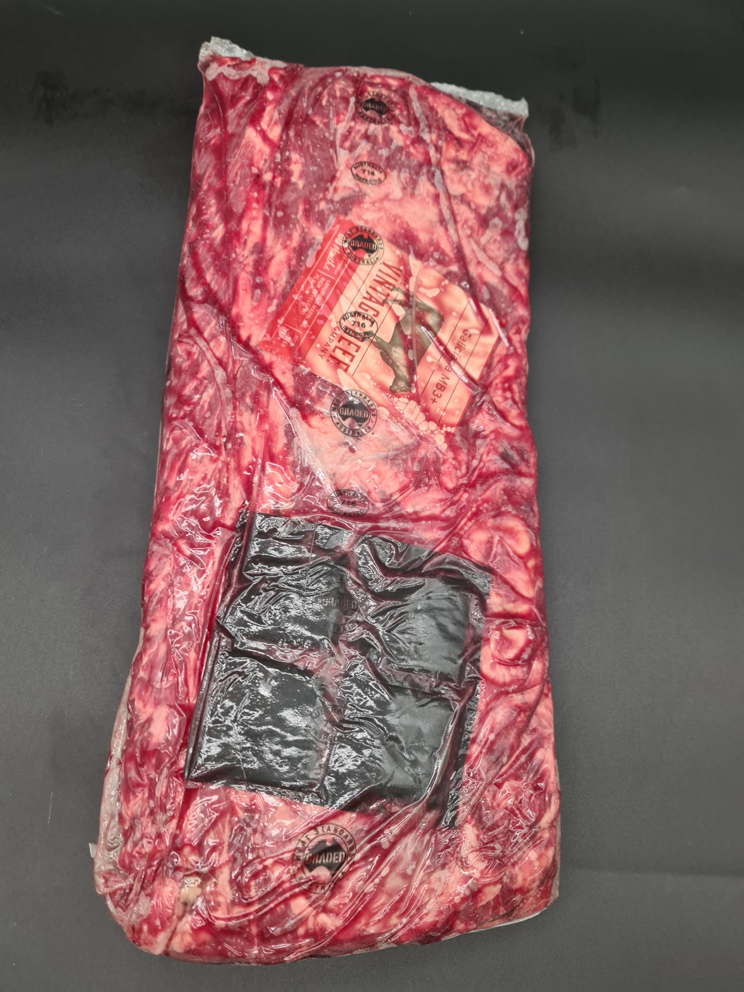 Two premium beef cuts side by side in clear packaging