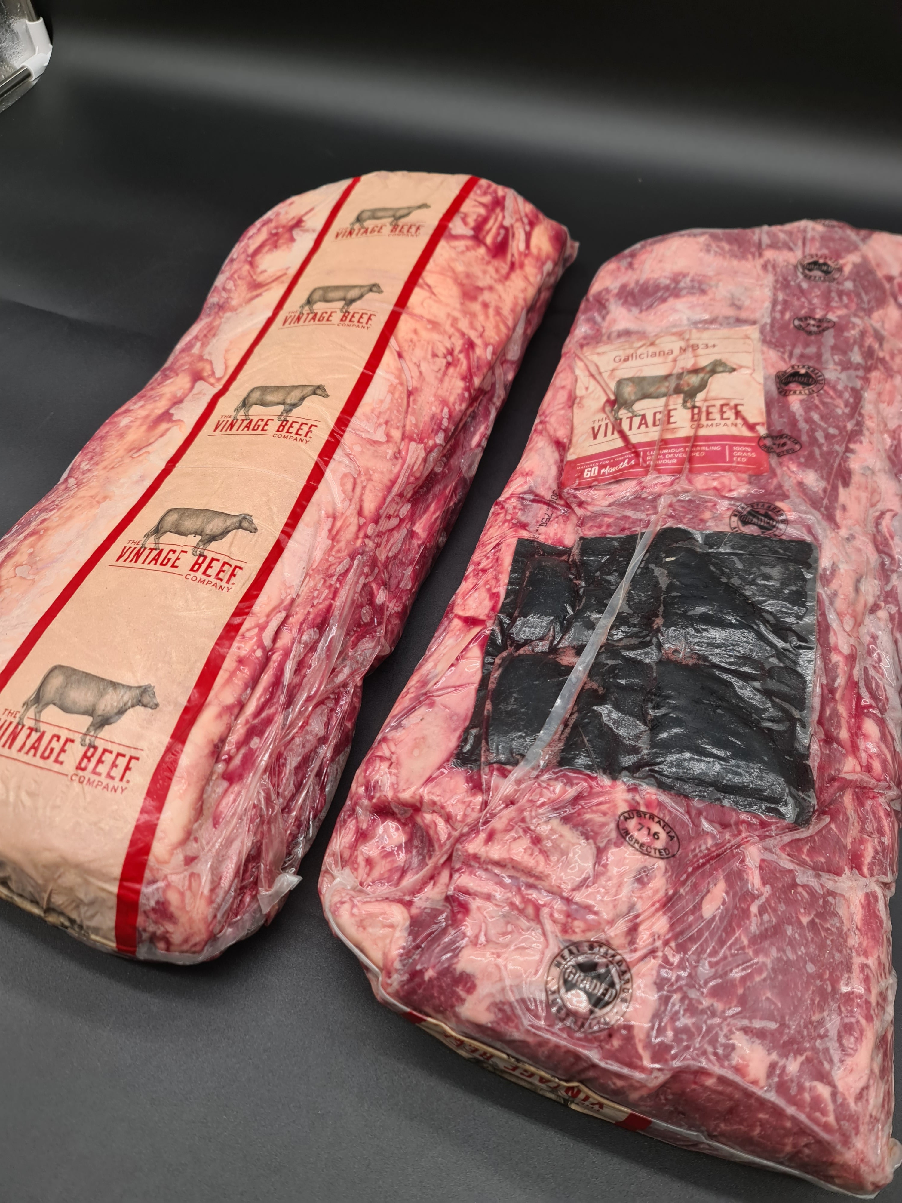 Top view of premium beef cuts inside an open box