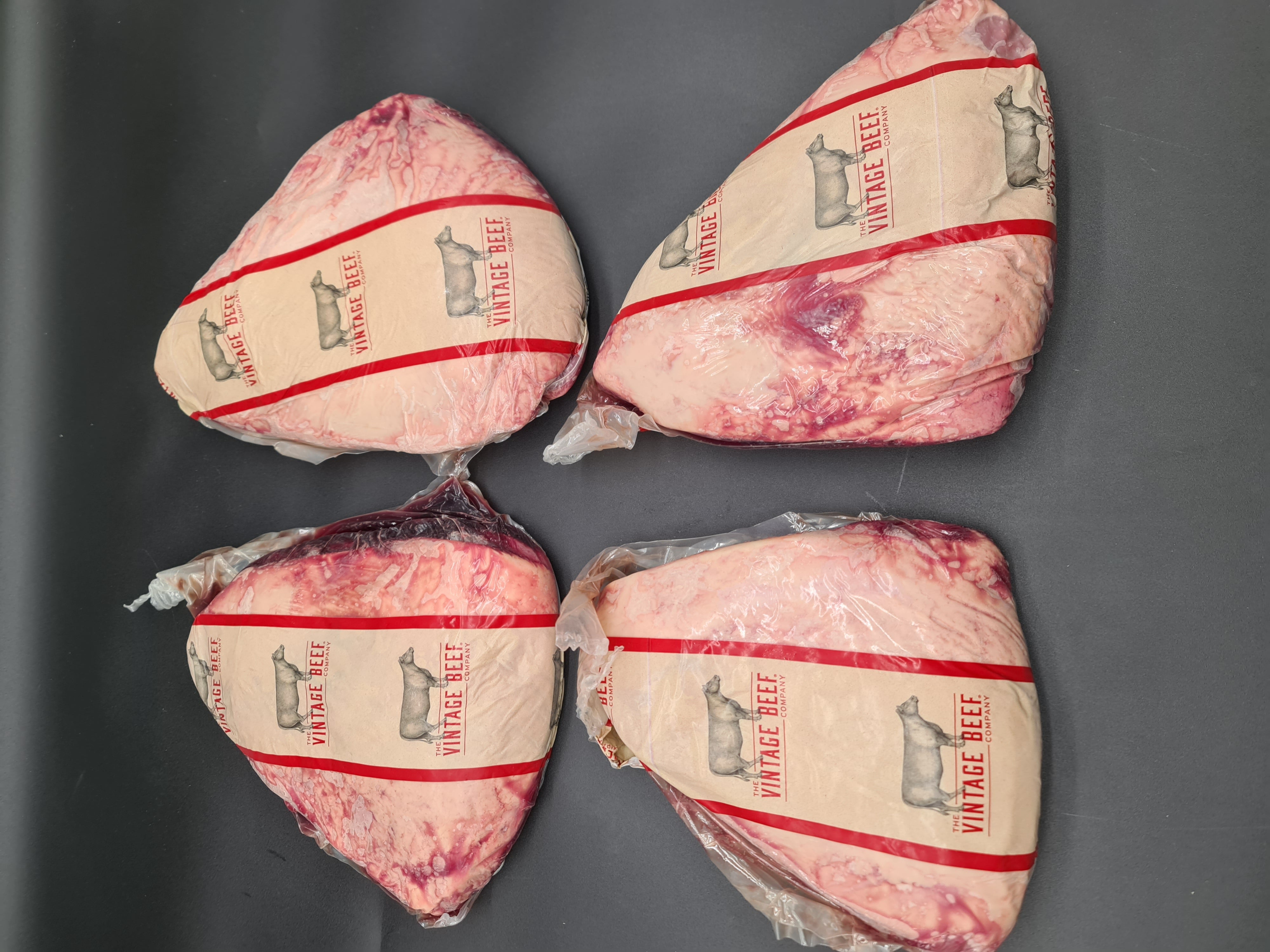 Close-up of premium meat cuts packed in clear packaging