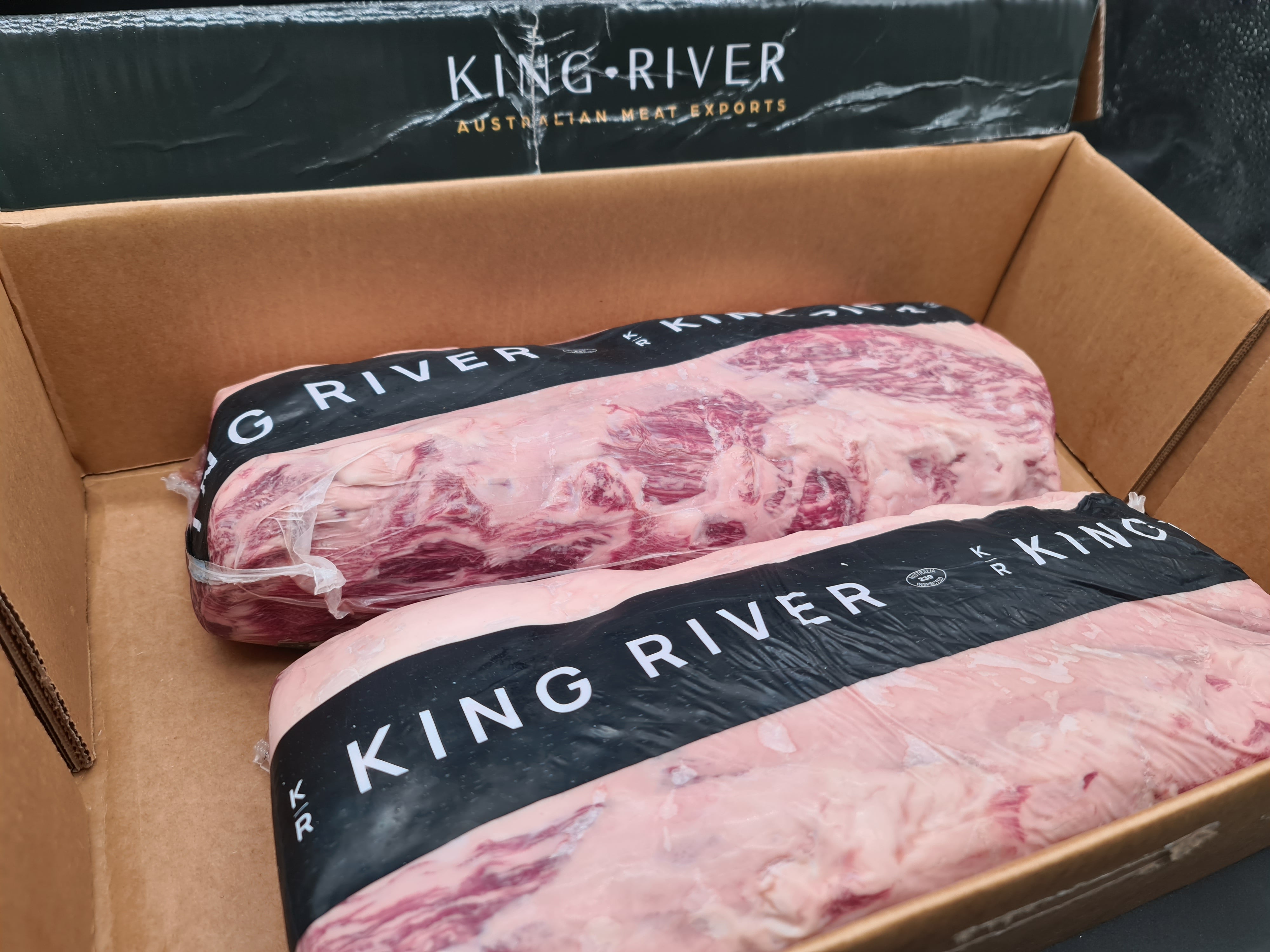 Close-up of premium beef cuts in clear packaging