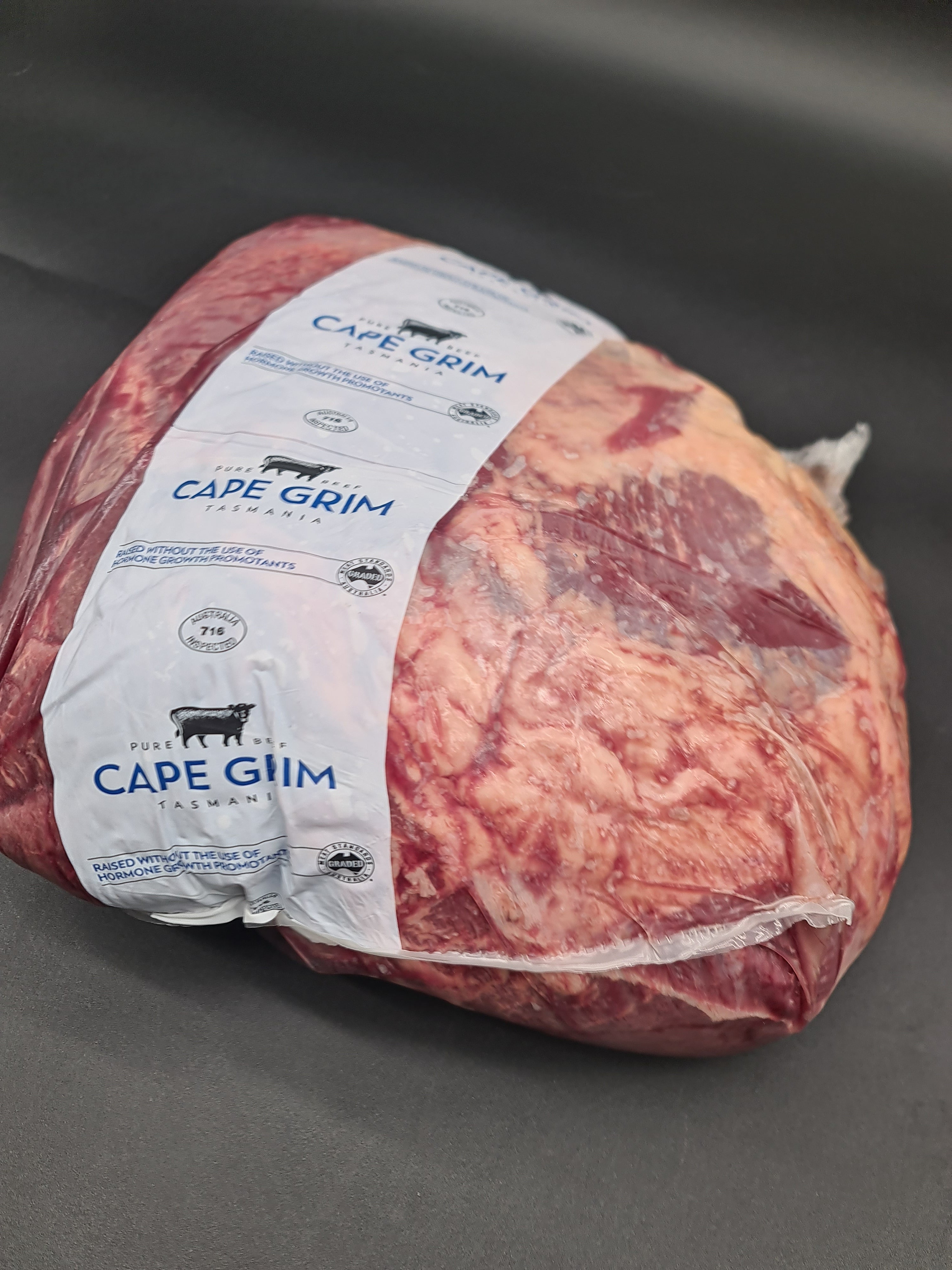 Close-up of two premium meat cuts with visible fat caps