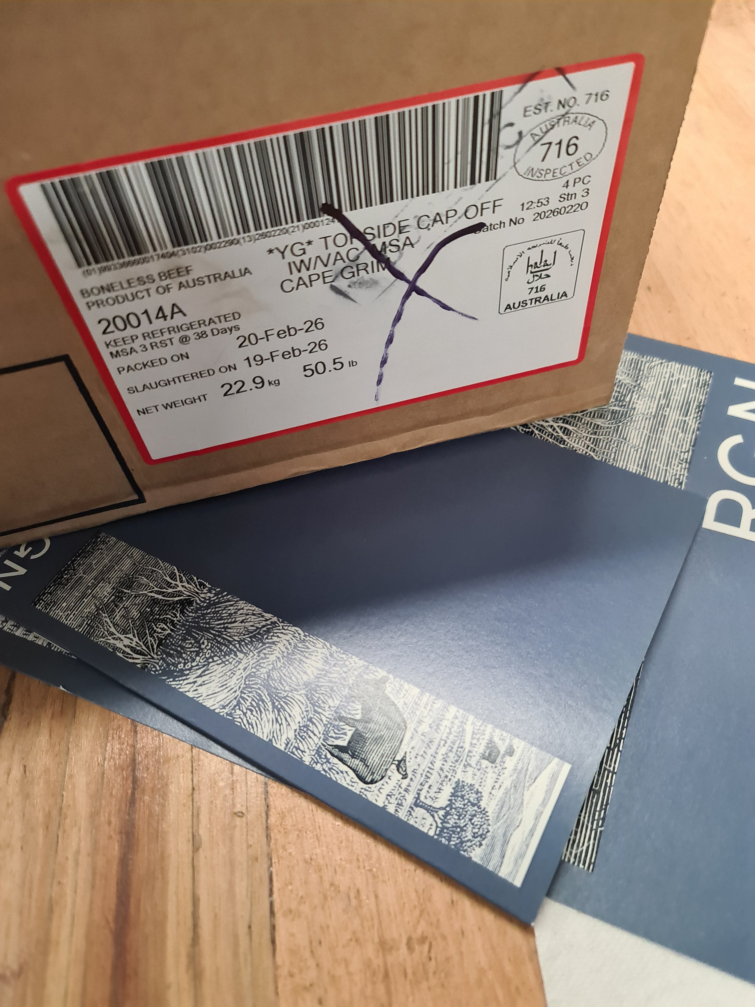 Angled view of a closed premium meat box