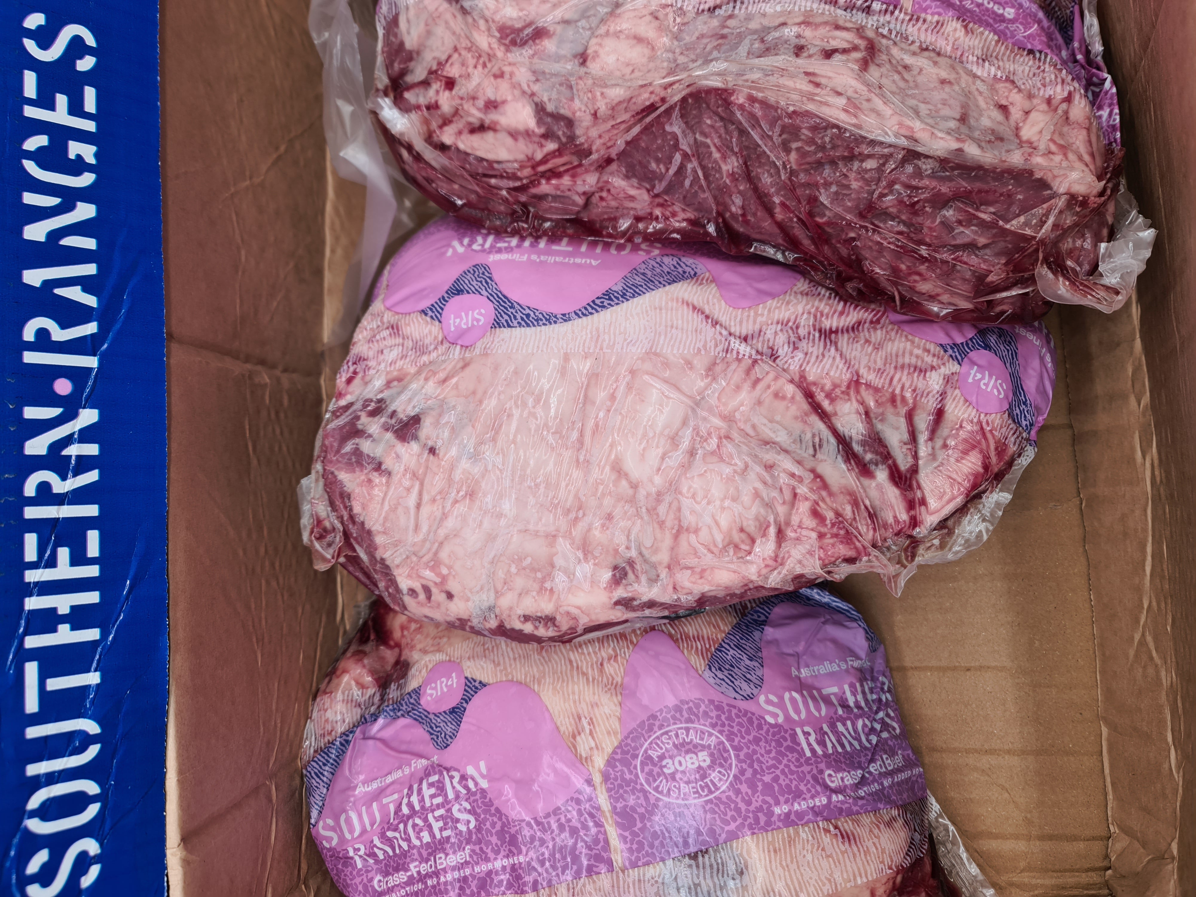 Angled premium meat cut showing lean meat and fat cap