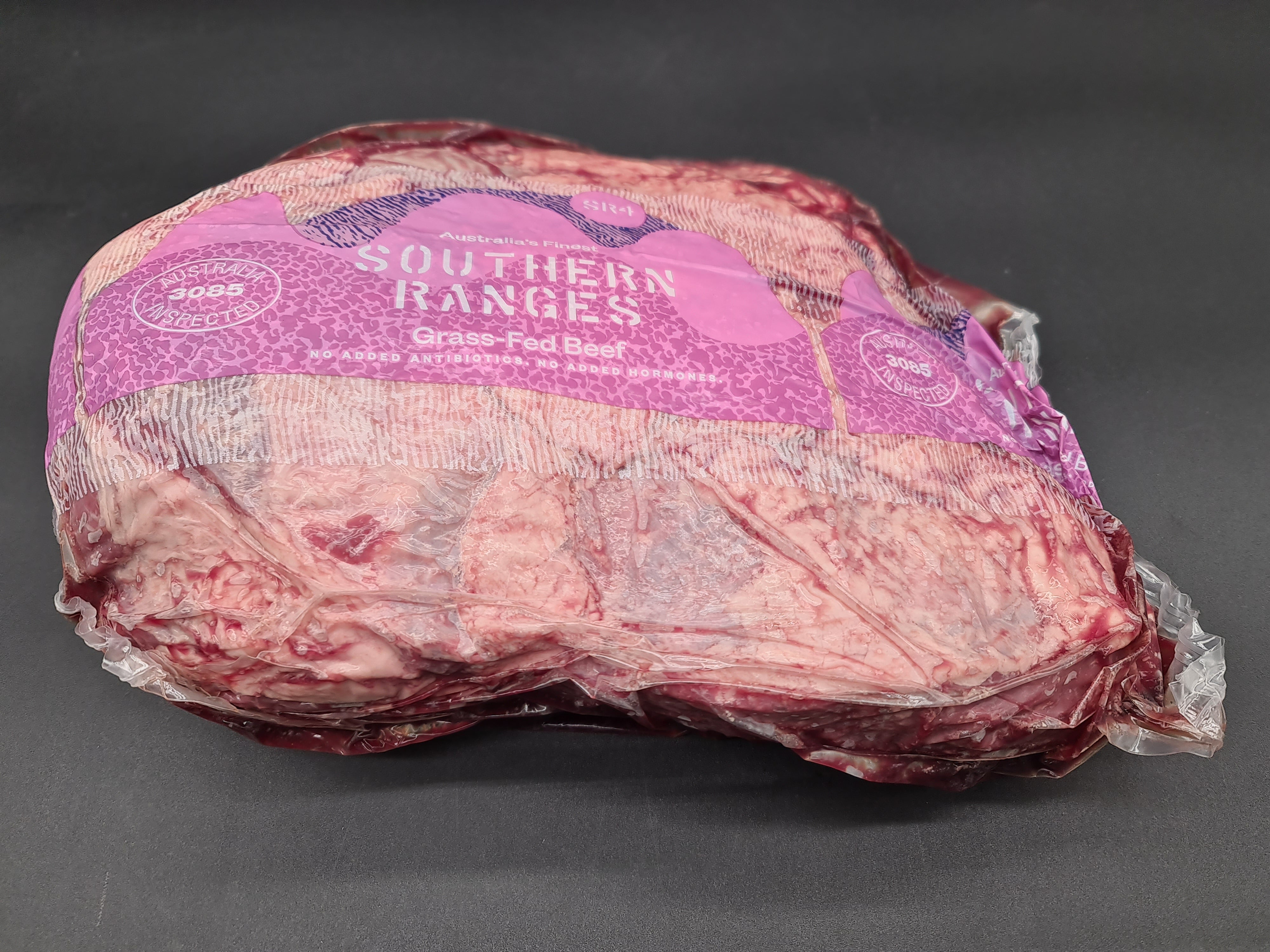 Two premium meat cuts side by side in vacuum packaging