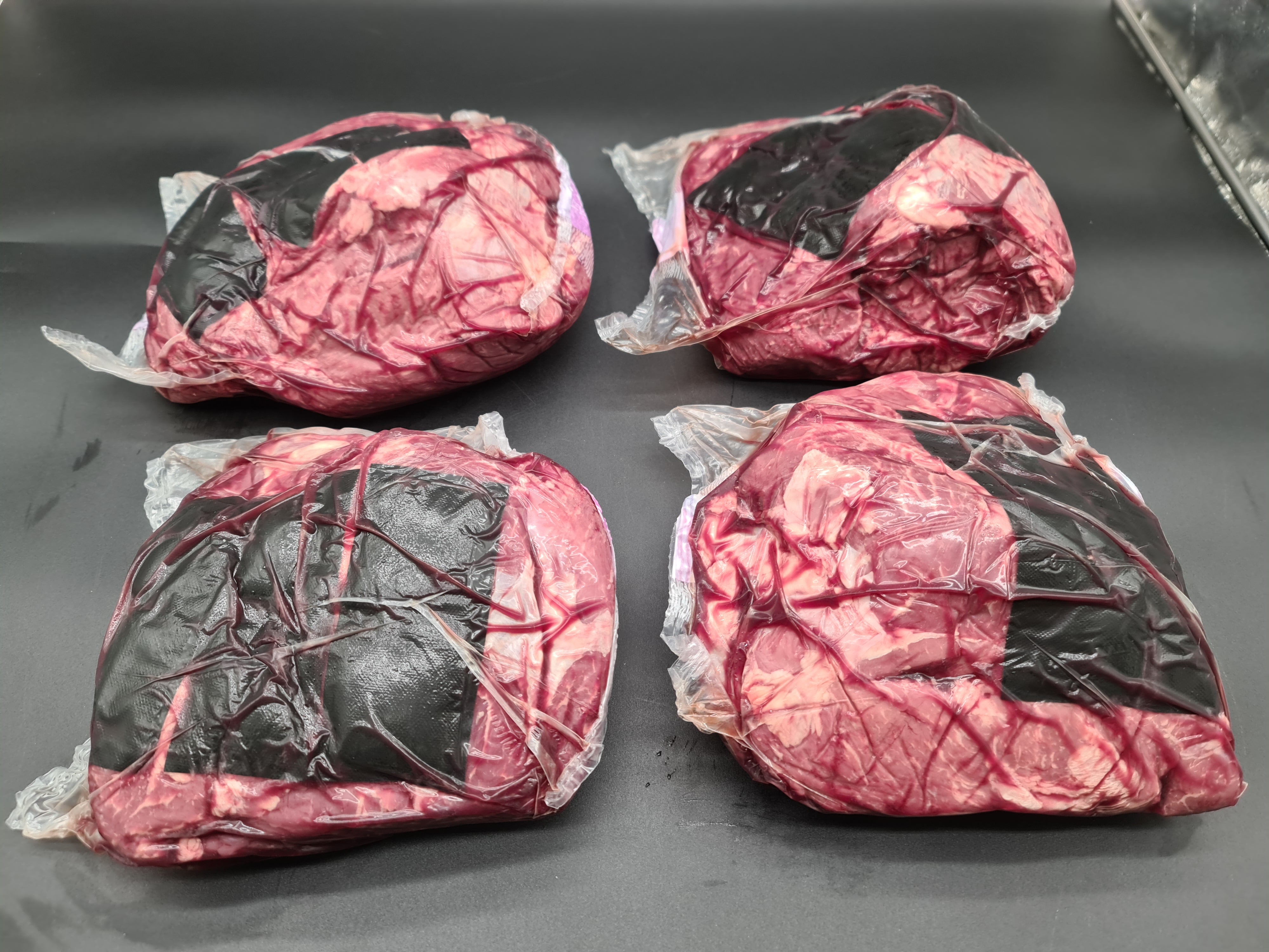 Close-up of premium meat cut in clear packaging