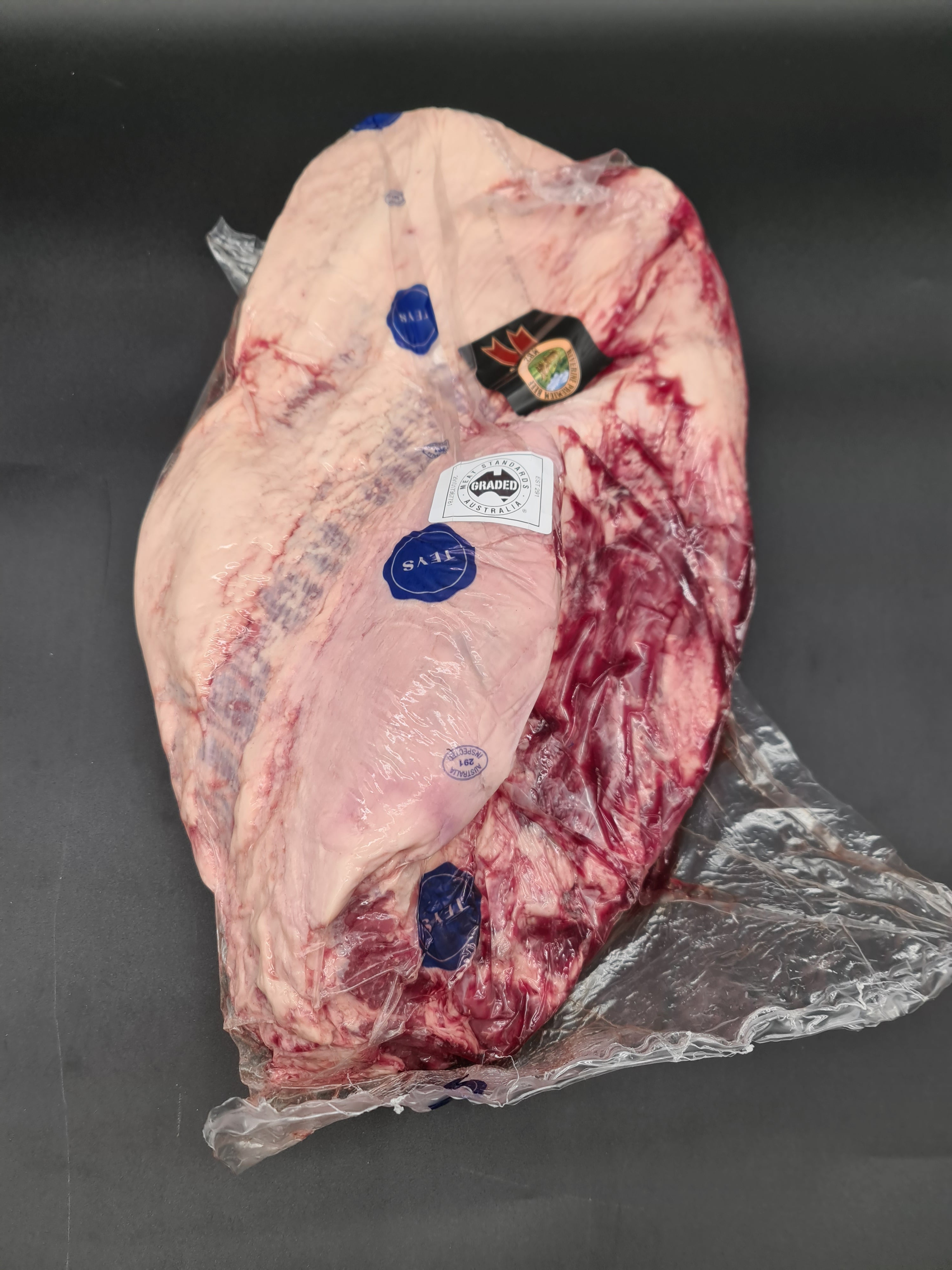Open premium meat box with vacuum-packed cuts inside