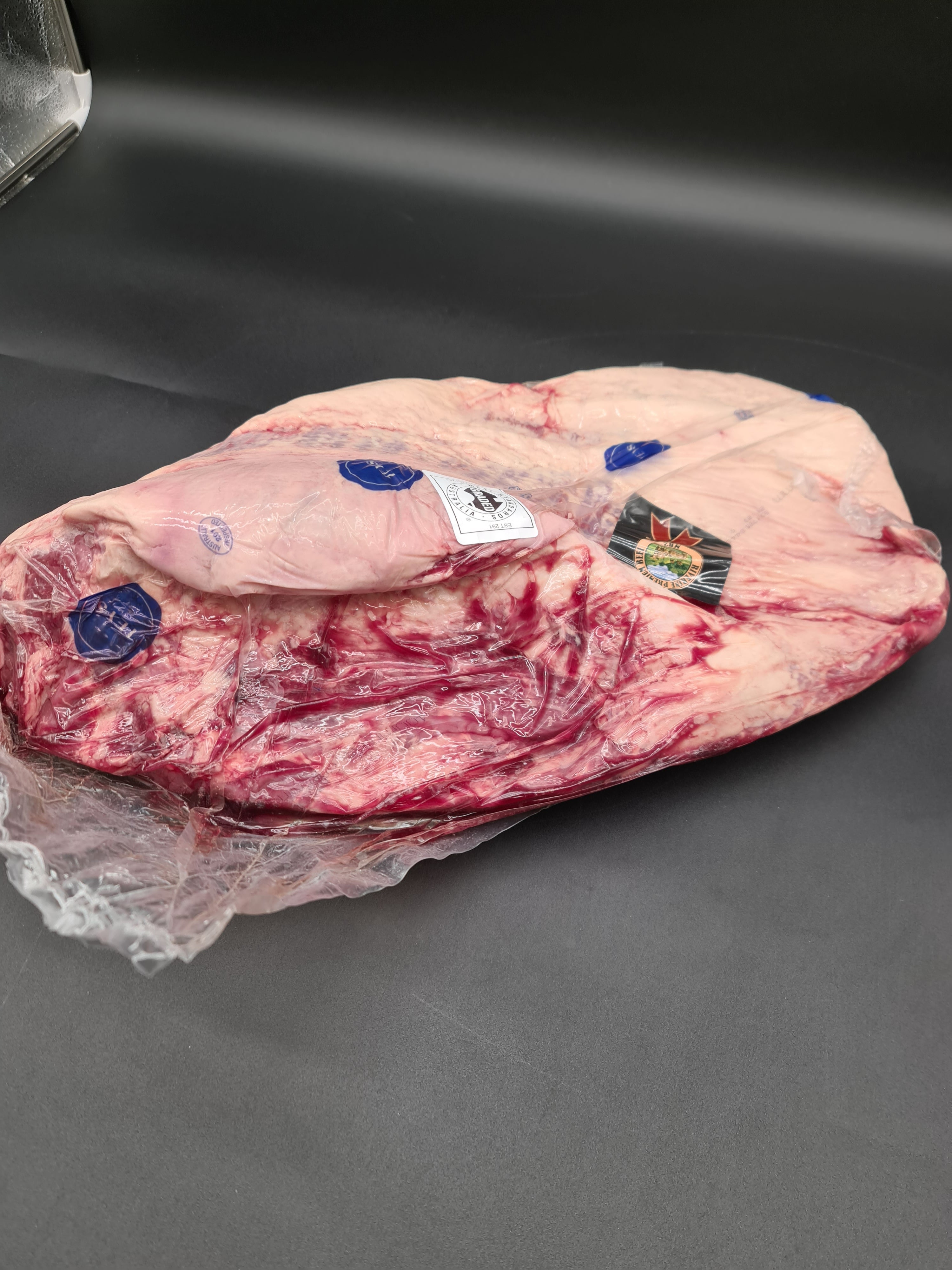 Angled premium meat cut showing lean meat and fat cap
