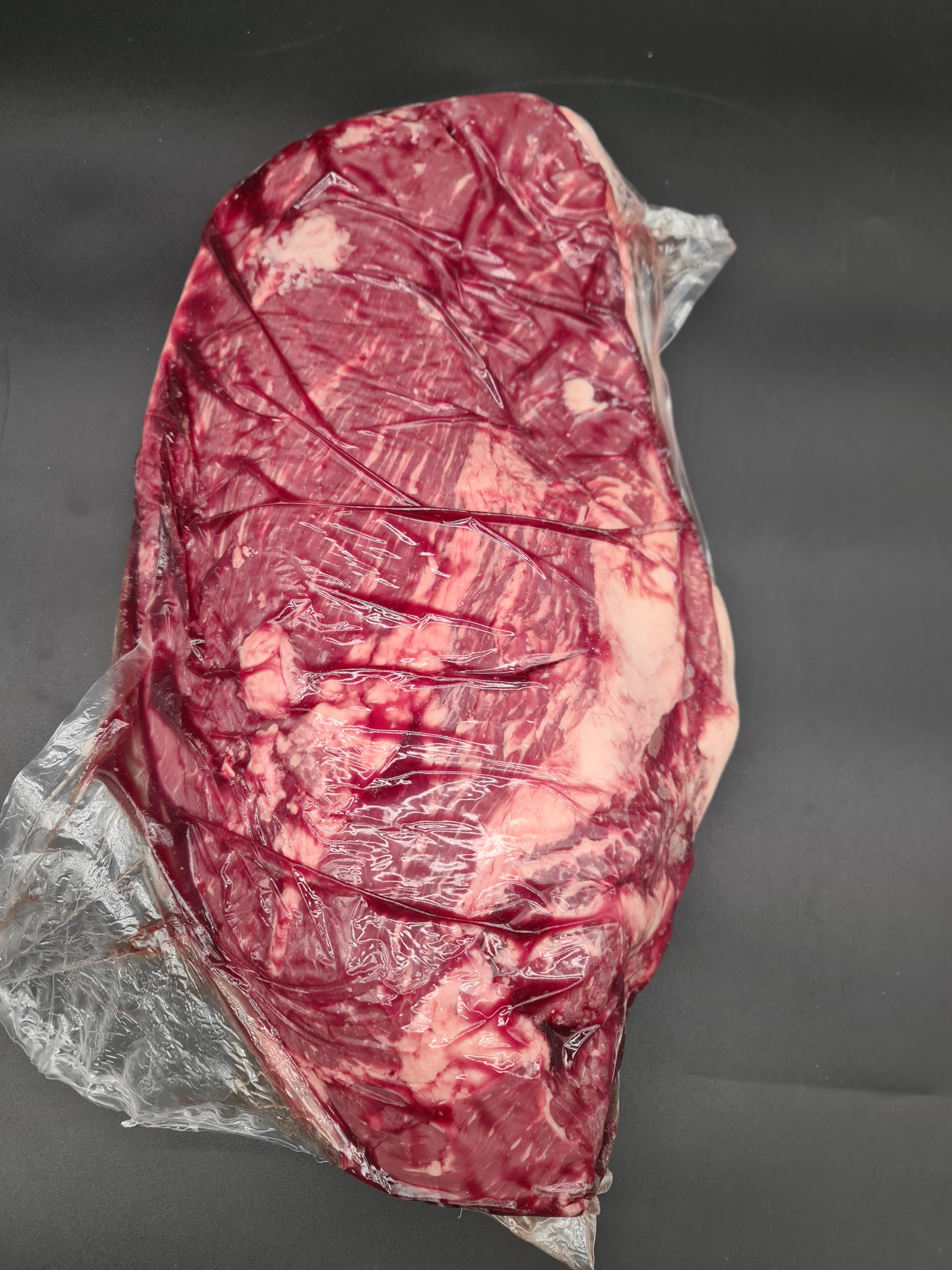 Angled view of a closed premium meat box