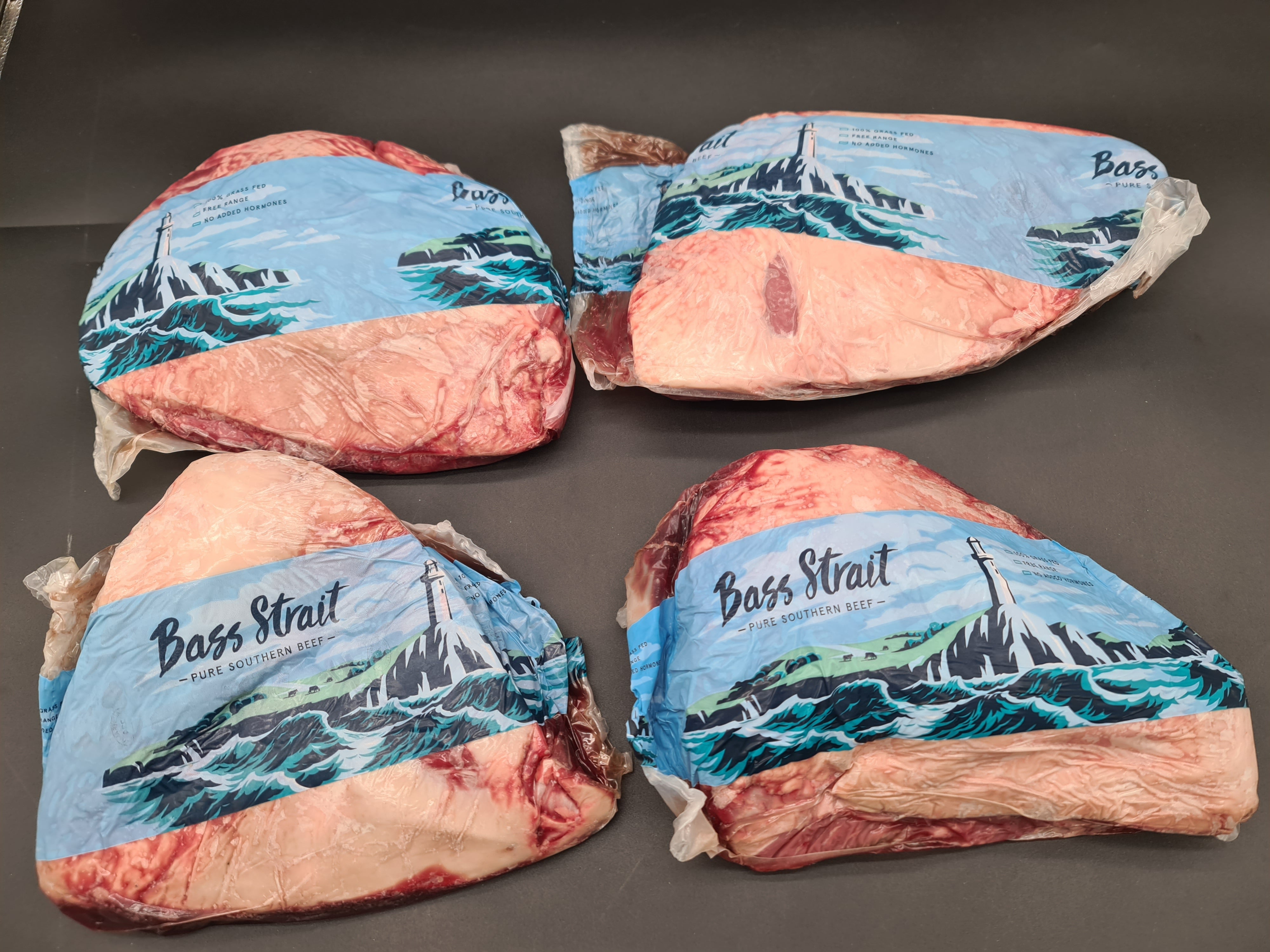 Closed premium meat box on a dark studio surface