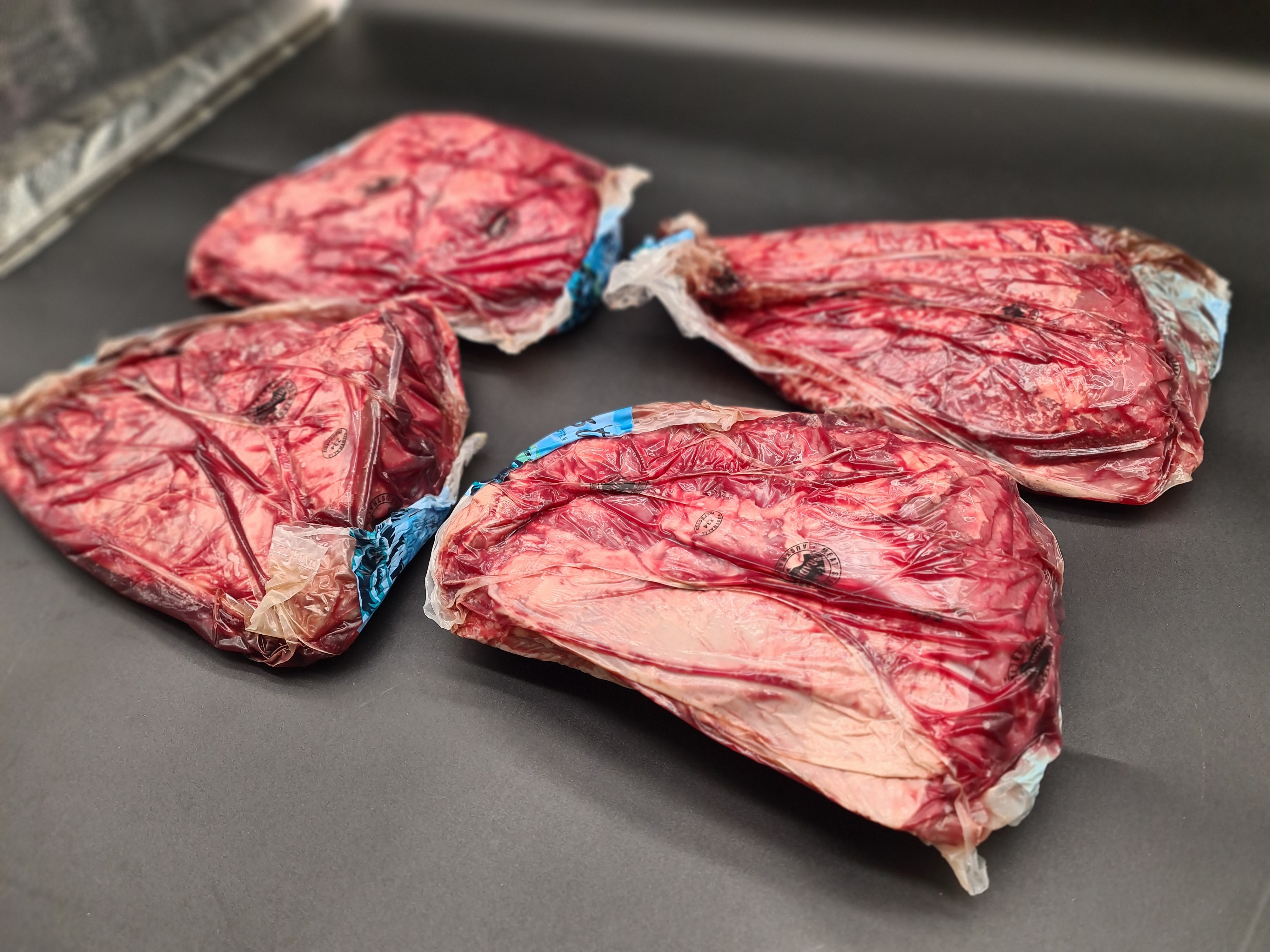 Close-up of premium meat cut in clear packaging